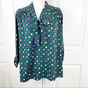 Green polka-dot blouse with bow